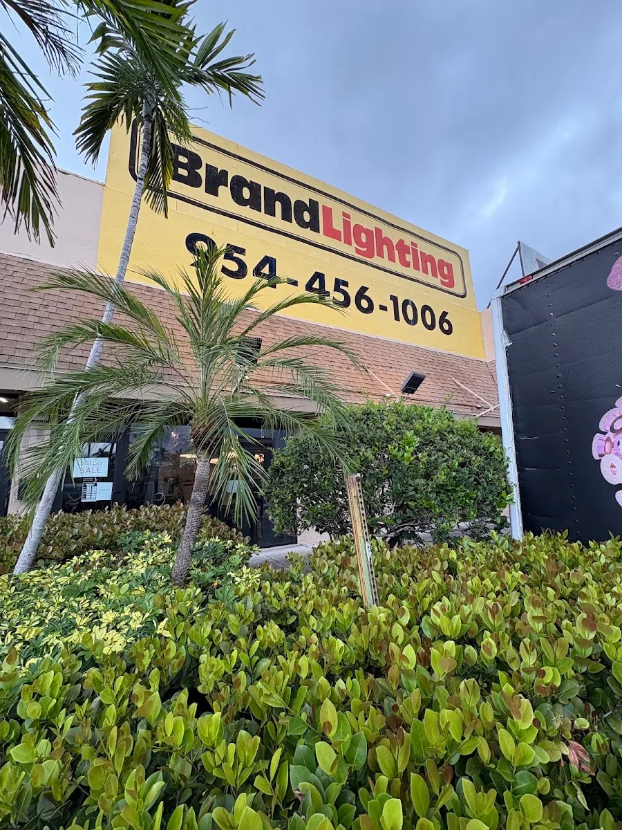 The Hold the Spec storefront sign in Hallandale Beach